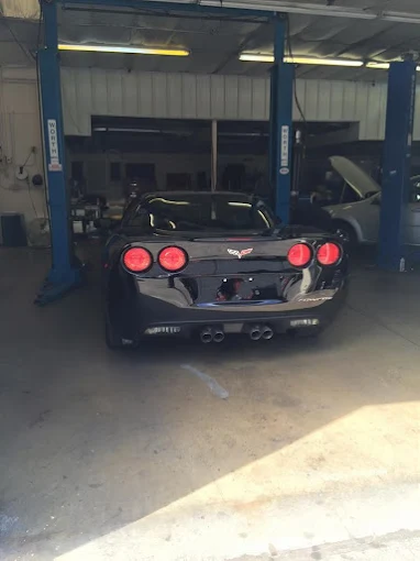 Corvette in Lucas Auto shop bay
